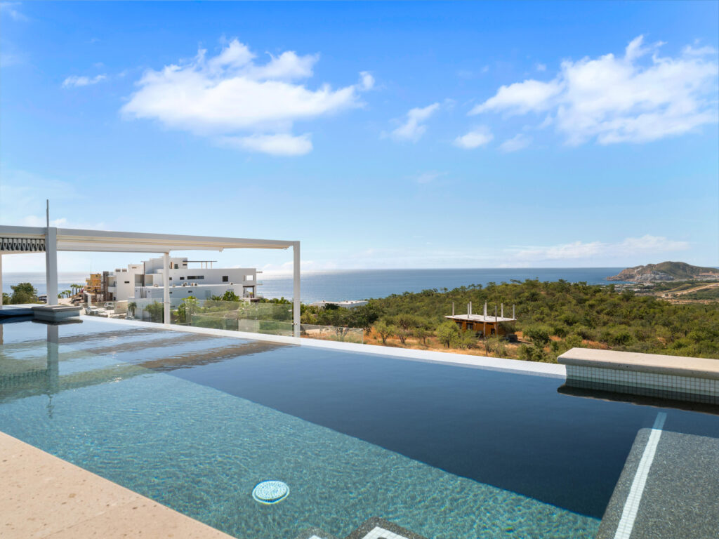 Maravilla Section 4- Las Canadas Discover refined indoor-outdoor living at Cañada 9, set within Querencia, San Jose del Cabo's premier private golf community. Soaring beamed ceilings, walls of pocket glass, and luminous marble floors define an open great room that flows effortlessly to the terrace, infinity-edge pool, and stone-clad water feature -- all framed by panoramic Sea of Cortez and mountain – El Tule, San Jose Corridor, BS